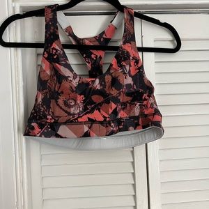 Lululemon sports bra. Size 12. Pink floral pattern. Never worn